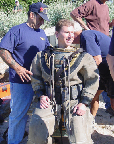 Adam Brown suiting up for underwater video shoot.